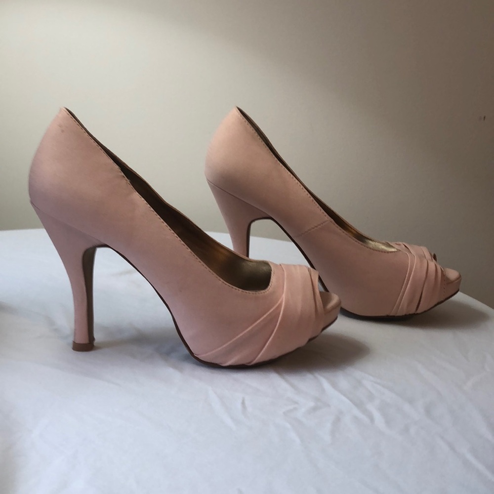 Pink peep toe pumps